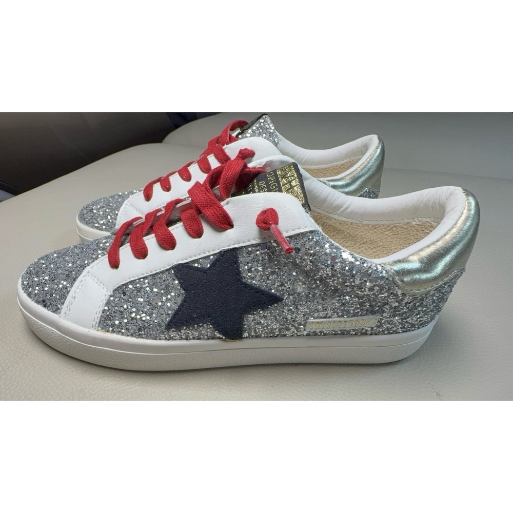 Women's 8.5 Vintage Havana silver glittery, black star, & red shoelaces shoes